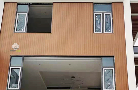 Exterior composite wood panels